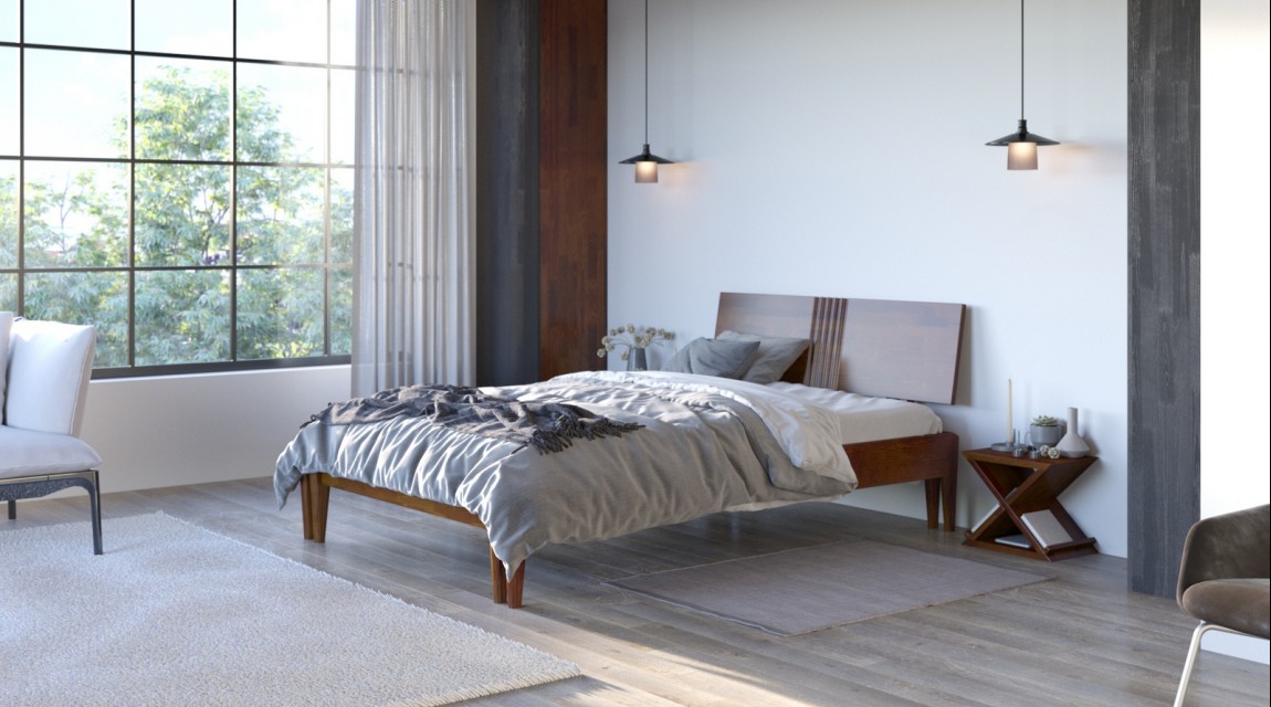  Drewniane łóżko sypialniane na tle jasnej ściany oraz podłogi