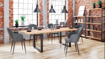 Industrialna jadalnia ze stołem na płozach w towarzystwie tapicerowanych krzeseł