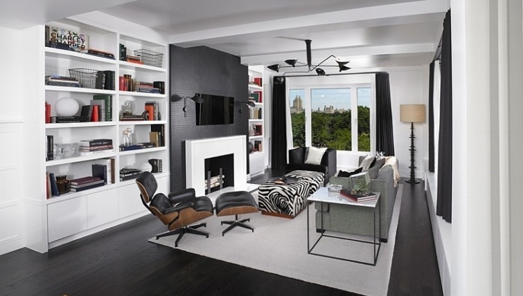 Stylowy salon w biało-czarnych kolorach z nowoczesnym kominkiem
