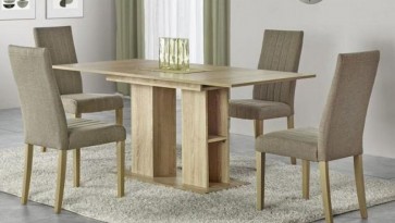 Wnętrze jadalniane uzupełnione w rozkładany stół i tapicerowane krzesła na kremowym dywanie