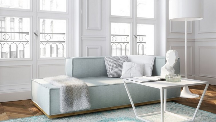 Stolik z marmurowym blatem i tapicerowana sofa w salonie z dużymi oknami i balkonem