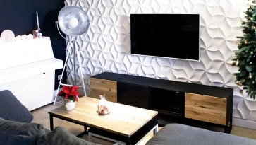 Szafka RTV i stolik kawowy w stylu industrialnym i z dodatkiem litego drewna w nowoczesnym wnętrzu