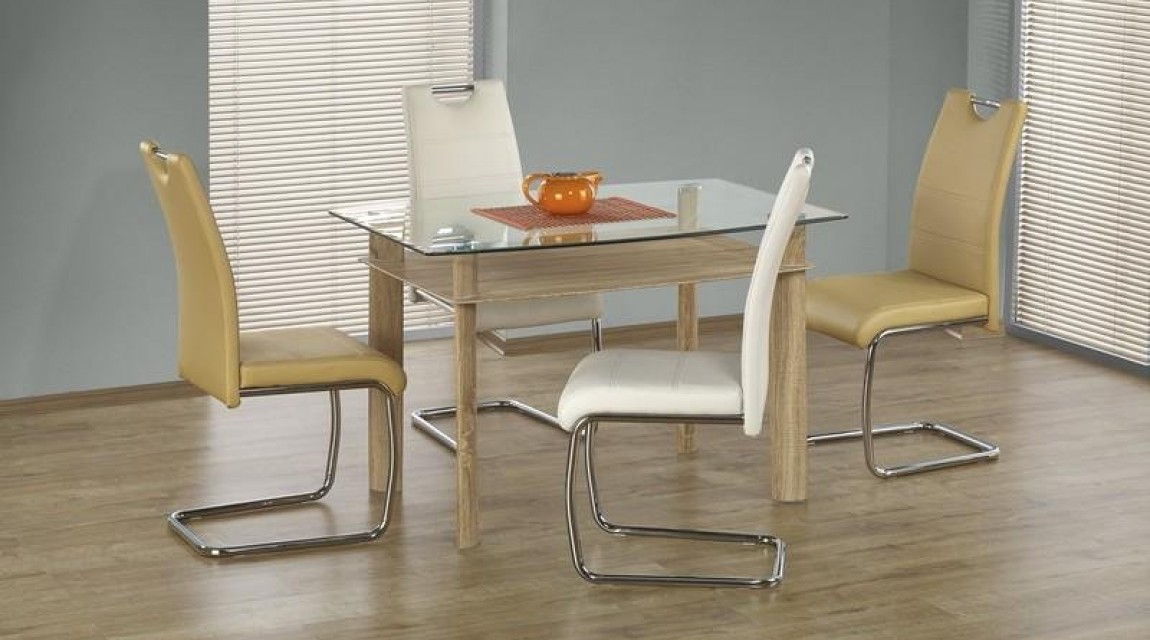 Krzesła na płozach tapicerowane ekoskórą z rączką ułatwiającą ich odsuwanie od stołu