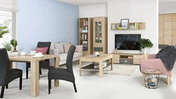 Jadalnia połączona z salonem wyposażona w minimalistyczne meble w dekorze drewnianym