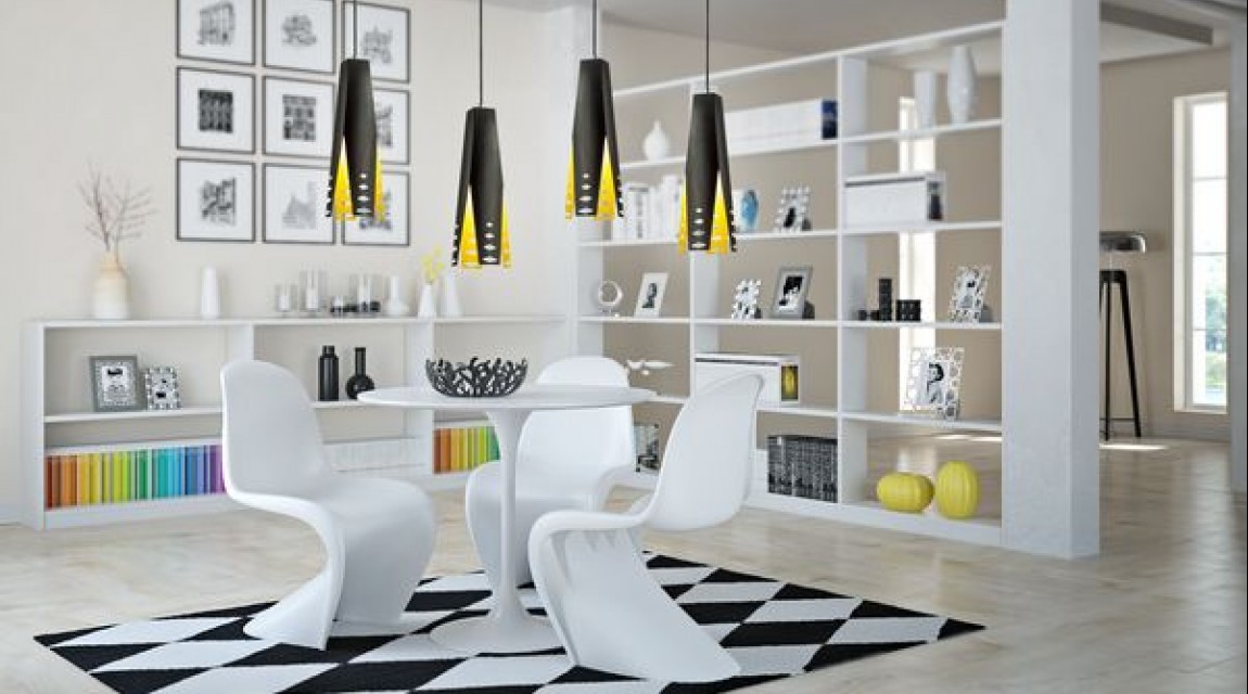 Designerskie lampy wiszące oraz okrągły stół z profilowanymi krzesłami