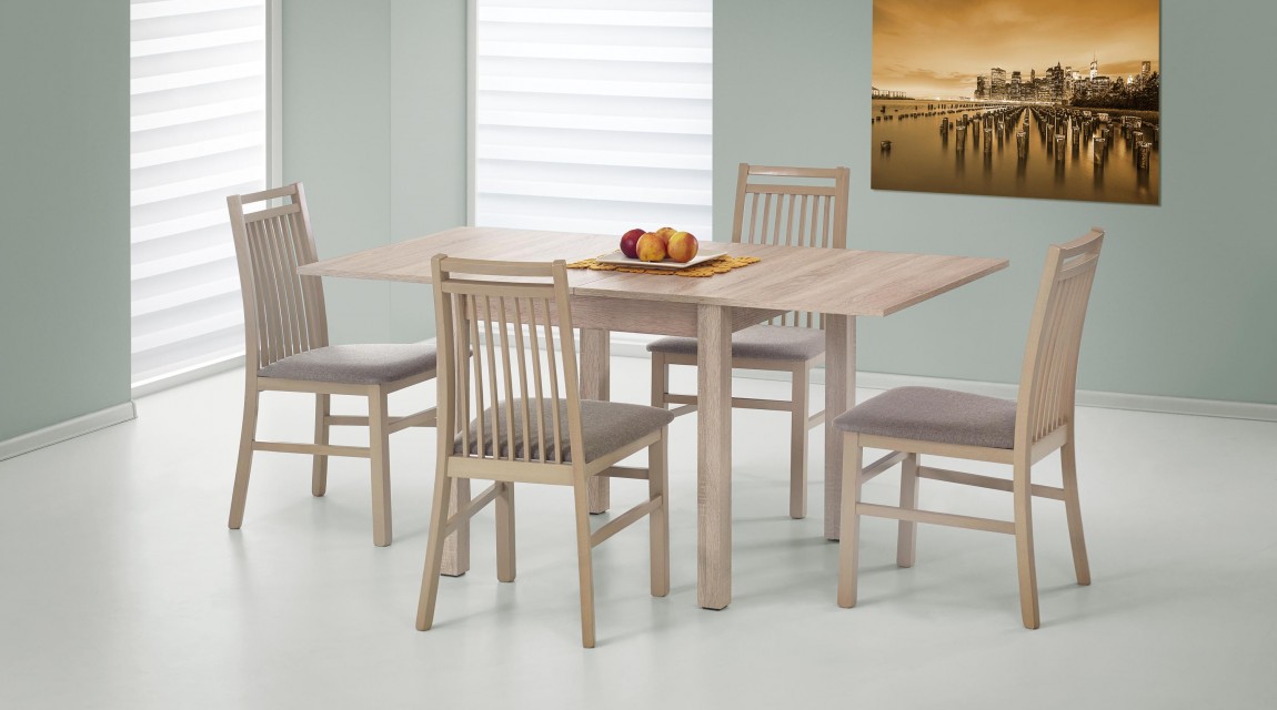 Rozkładany stół w kolorze dąb sonoma oraz krzesła z tapicerowanym siedziskiem