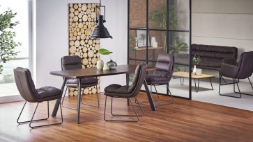 Stół z prostokątnym blatem oraz krzesła ze skóry ekologicznej