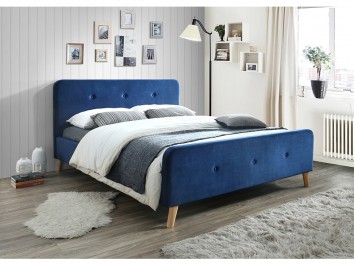Aksamitne łóżko w stylu skandynawskim na drewnianych nogach