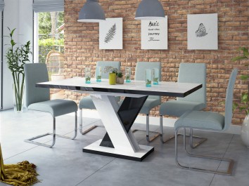 Designerski stół na tle ceglanej ściany oraz jasnej podłogi