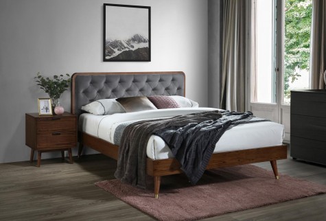 Łóżko sypialniane z wezgłowiem w eleganckiej sypialni