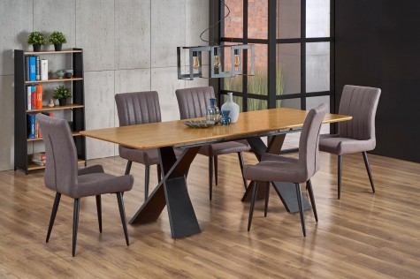 Rozkładany stół w stylu industrialnym z tapicerowanymi krzesłami