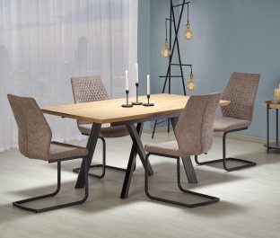 Rozkładany stół do jadalni w stylu industrialnym z tapicerowanymi krzesłami