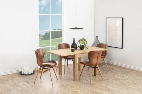 Klasyczny stół jadalniany z funkcją rozkładania i krzesła w stylu skandynawskim