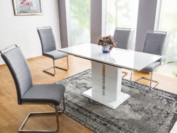 Stół do jadalni z lakierowanym i rozkładanym blatem oraz krzesła na płozach z metalową rączką