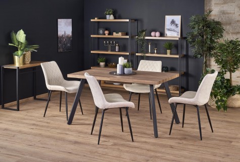 Stół z prostokątnym blatem w stylu industrialnym oraz krzesła ze specjalnie wyprofilowanym siedziskiem