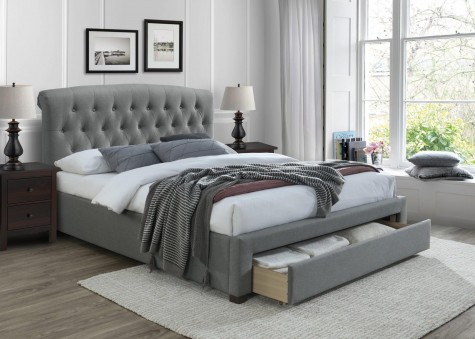Dwuosobowe łóżko tapicerowane z wysokim zagłówkiem pikowanym i wysuwaną szufladą