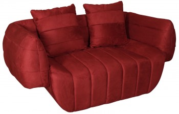 Welurowa sofa z dekoracyjnymi poduszkami Nua N90