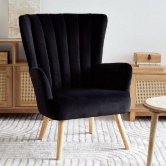 Welurowy fotel w stylu skandynawskim Mills, nóżki naturalne